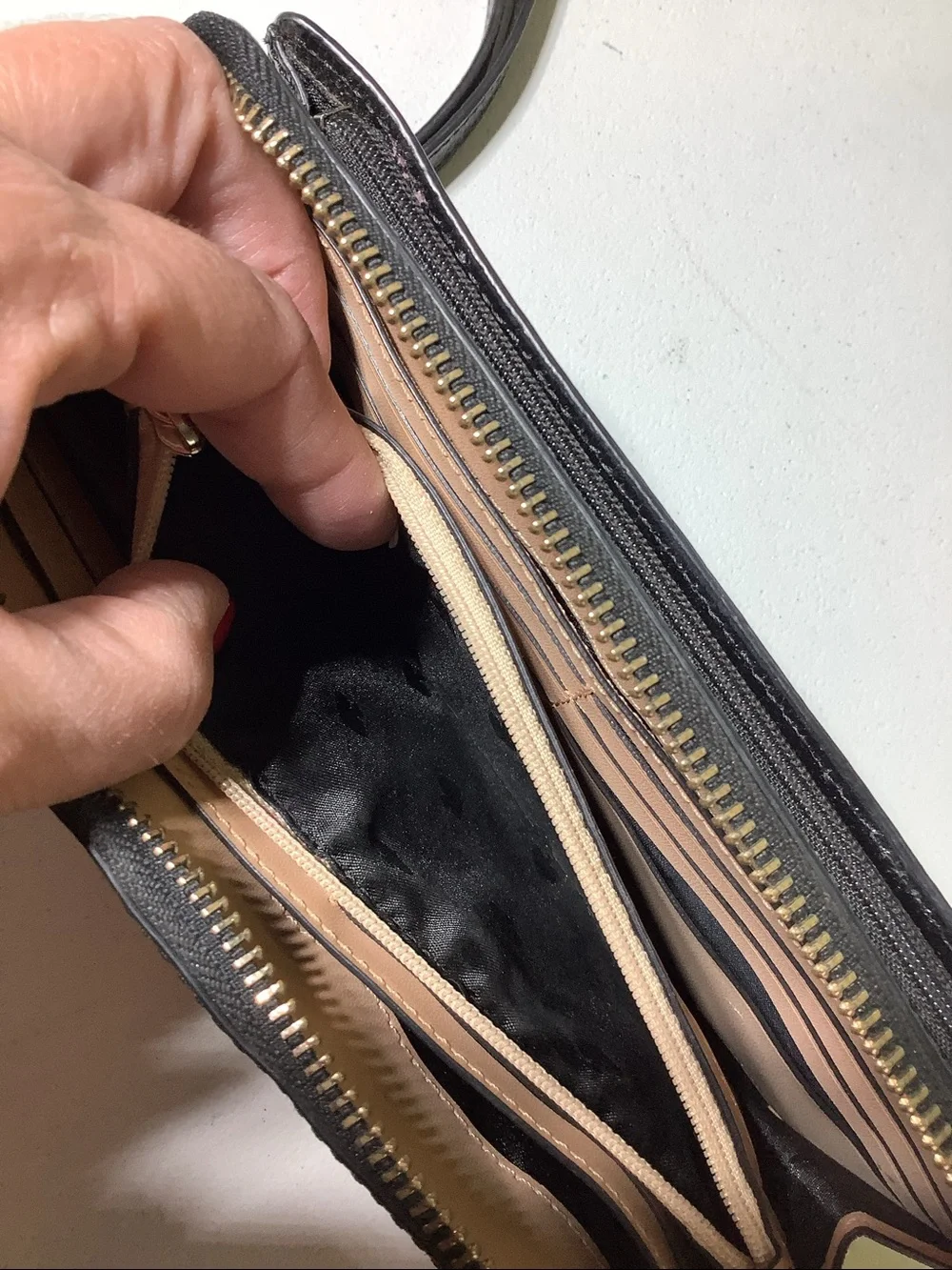 Kate Spade NY black zip around wristlet/wallet